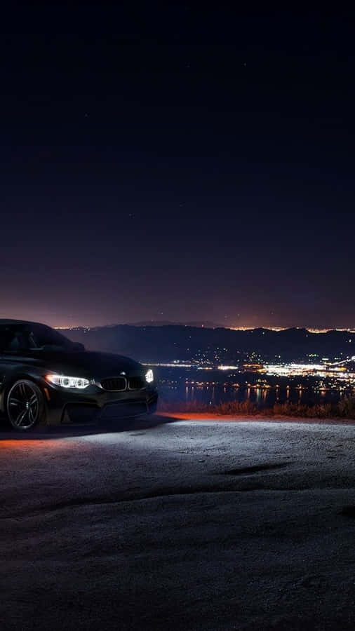 Enjoy A Luxurious Experience With The Bmw Iphone Wallpaper