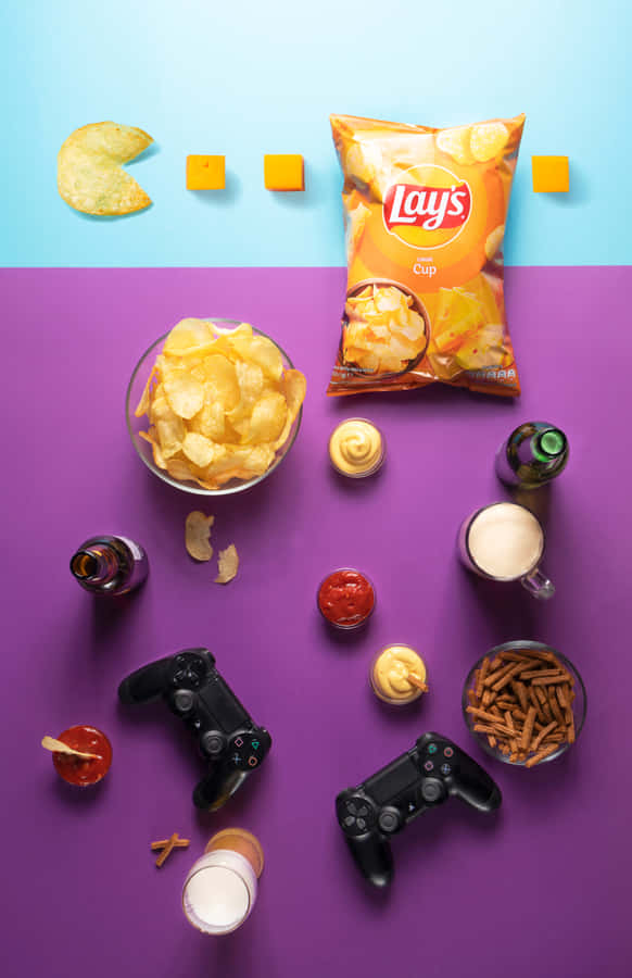 Enjoy The Crunchy Delight Of Potato Chips While Gaming Wallpaper