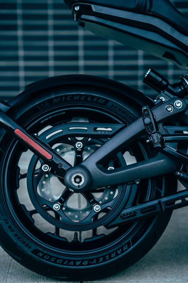 Enjoy The Freedom Of Riding On A Motorcycle With Your Iphone Wallpaper