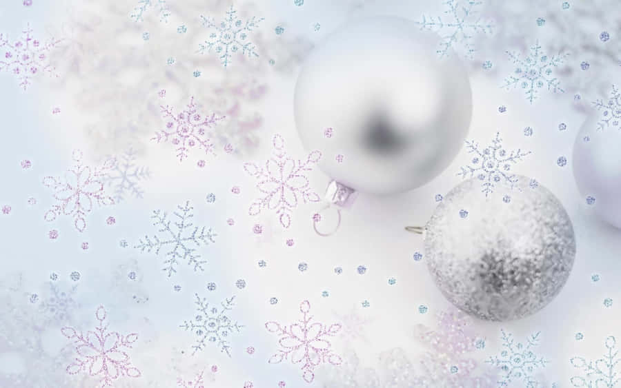 Enjoy The Snow-covered Beauty Of A White Christmas. Wallpaper