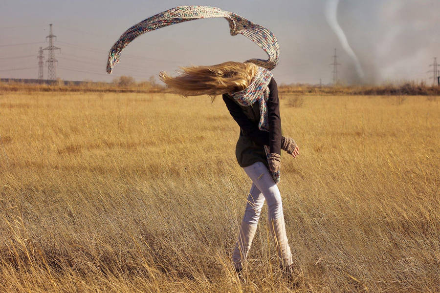 Enjoying A Windy Day Out In The Grass Wallpaper