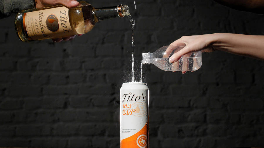 Enjoying Tito's Vodka On The Go Wallpaper