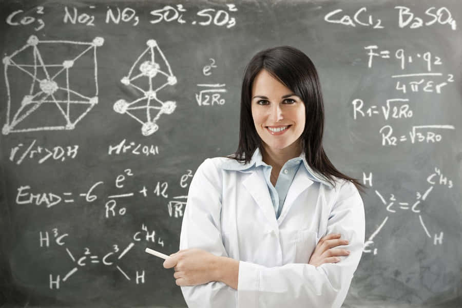 Enthusiastic Educator - A Cute Teacher Preparing For The Day's Lessons Wallpaper