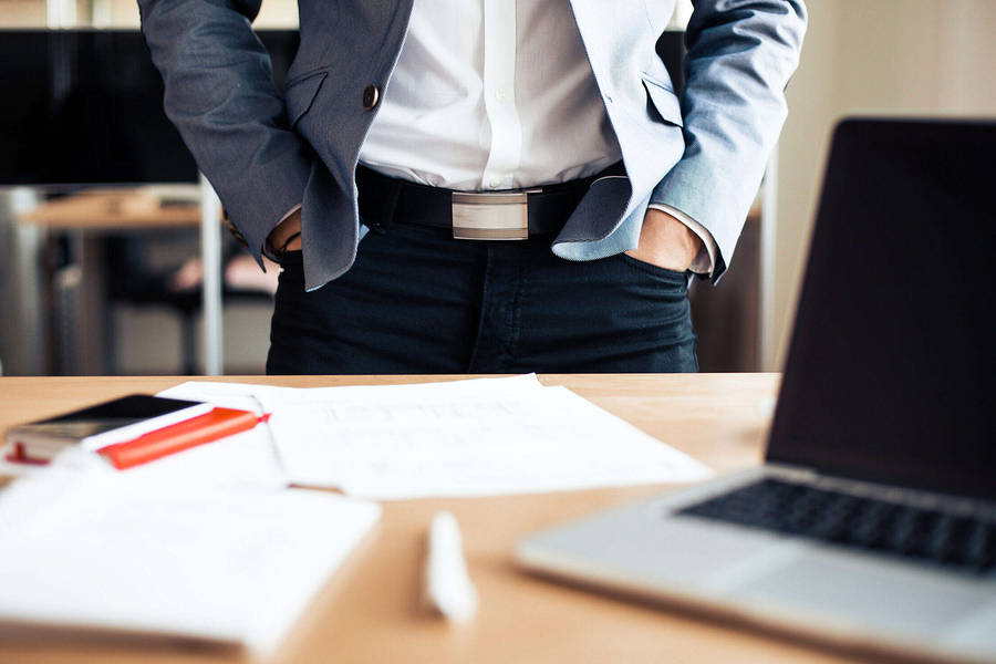 Entrepreneur At Work In Modern Office Wallpaper