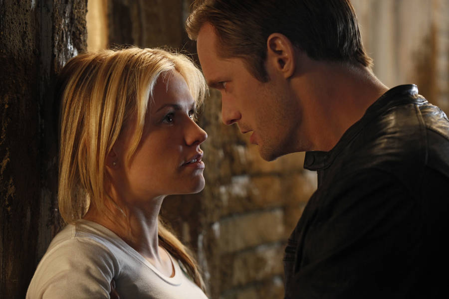 Eric Northman Glaring Intensely At Sookie Stackhouse In True Blood Wallpaper