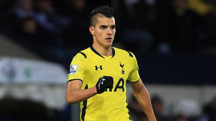 Erik Lamela Bright Yellow Football Jersey Wallpaper