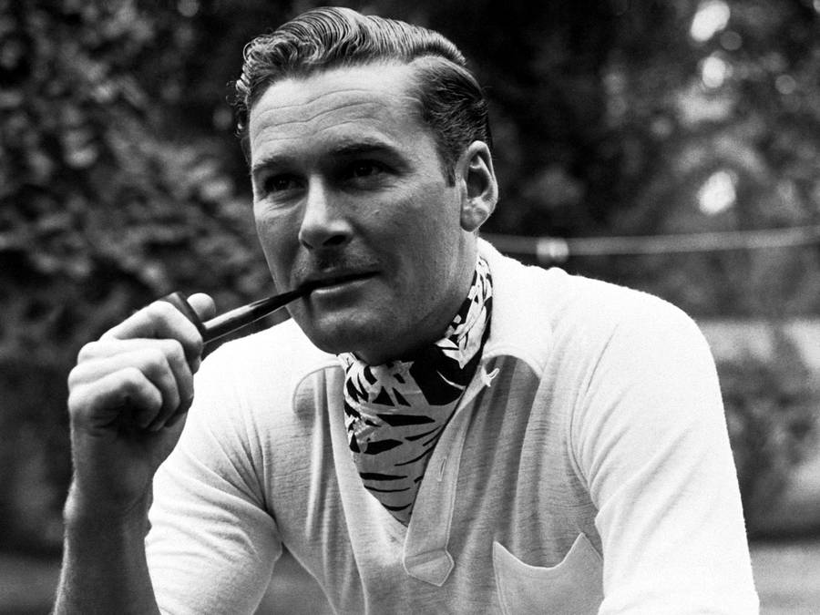 Errol Flynn Black And White Smoking Pipe Wallpaper