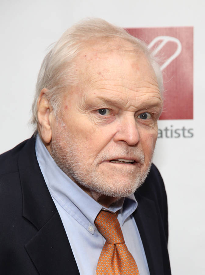 Esteemed Actor Brian Dennehy In Elegant Suit And Tie Wallpaper