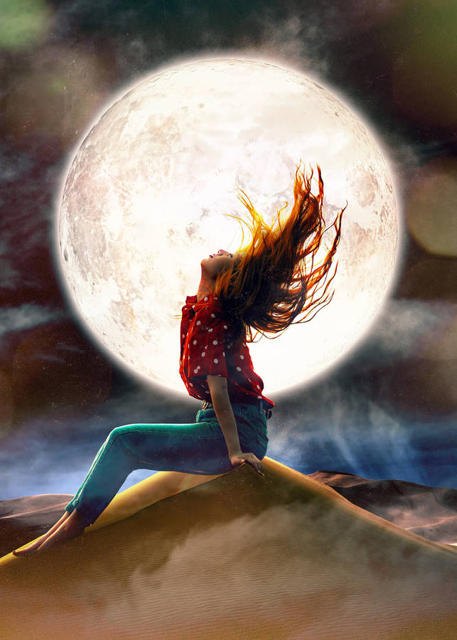 Ethereal Radiance Of Soul: Woman Embracing Freedom Under The Moonlight Wallpaper