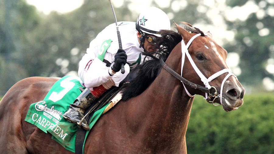 Excitement At The Kentucky Derby - Noble Horsemen In Action Wallpaper