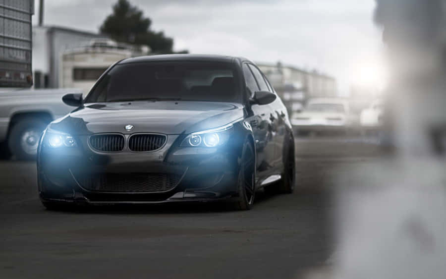 Experience Luxury And Performance With The Bmw M5 Wallpaper