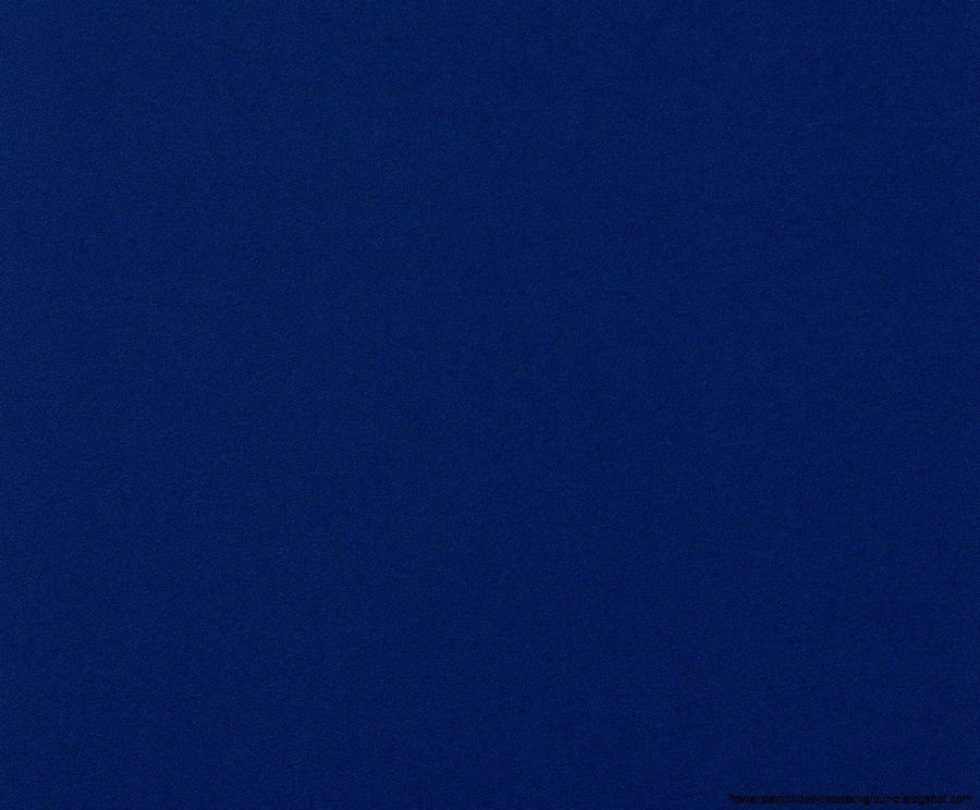 Experience The Beauty Of A Dark Blue Plain Wallpaper