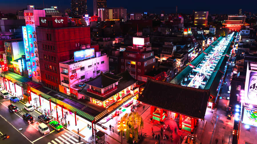 Explore The Energy And Experiences Of Tokyo's Vibrant Harajuku District. Wallpaper
