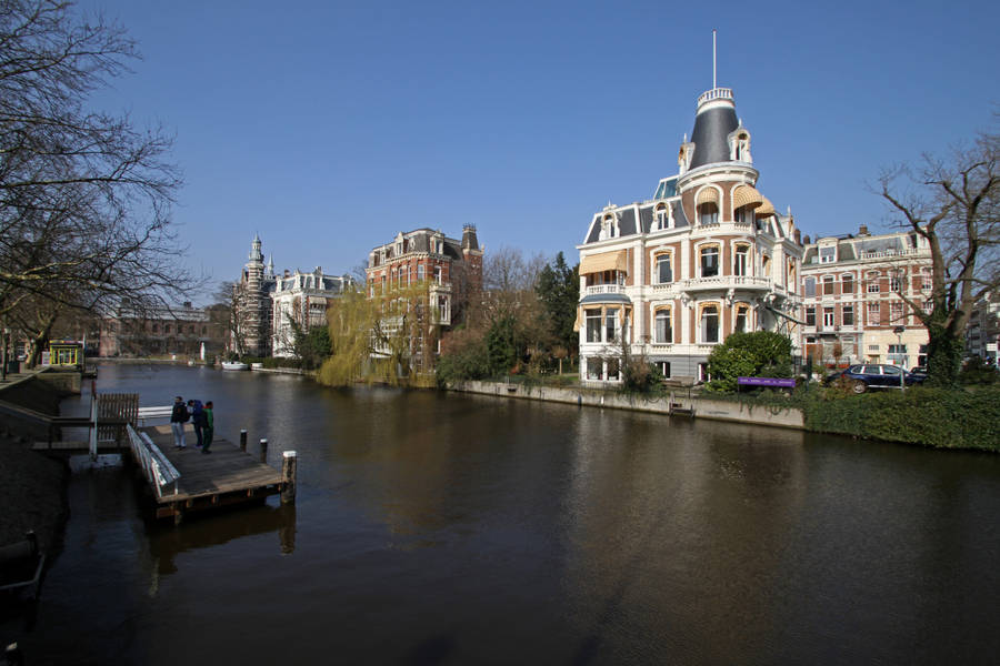 Exploring Amsterdam Canal Wallpaper