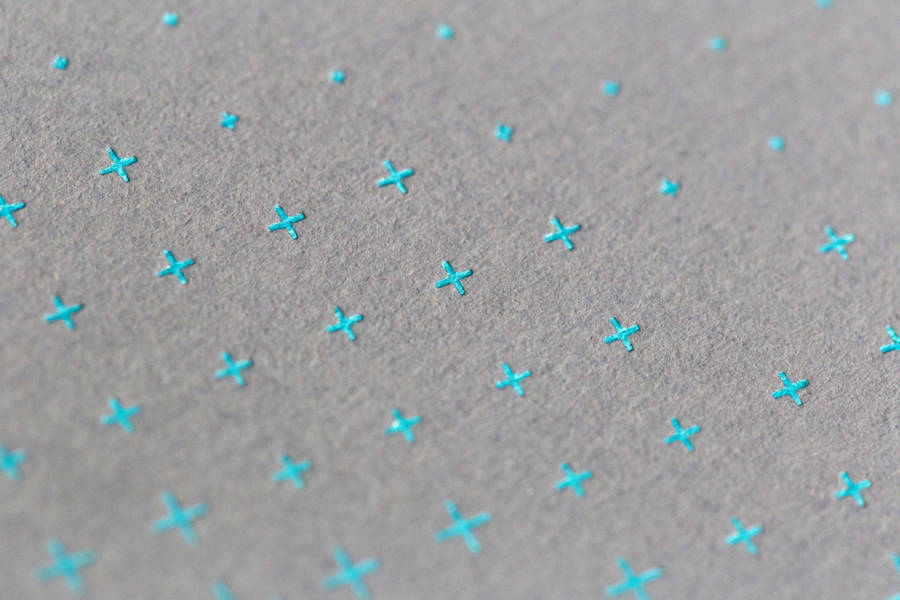 Exquisite Blue Crosses On Gray Paper Texture Wallpaper