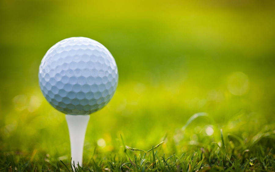 Exquisite Golf Ball On Tee Wallpaper