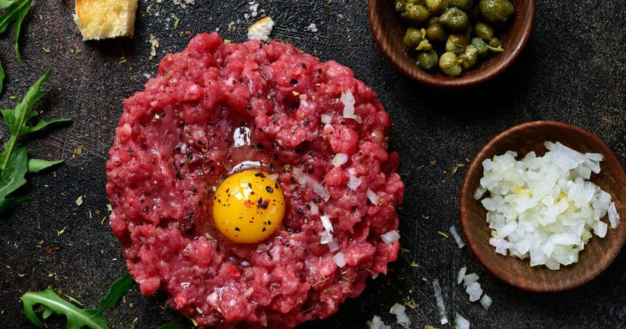 Exquisite Steak Tartare: The Epitome Of Gourmet Cuisine Wallpaper