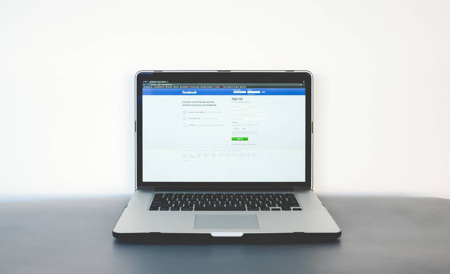 Facebook Login Page On Laptop Wallpaper