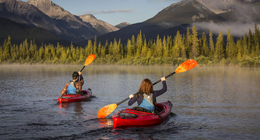 Family Kayaking Activity Wallpaper