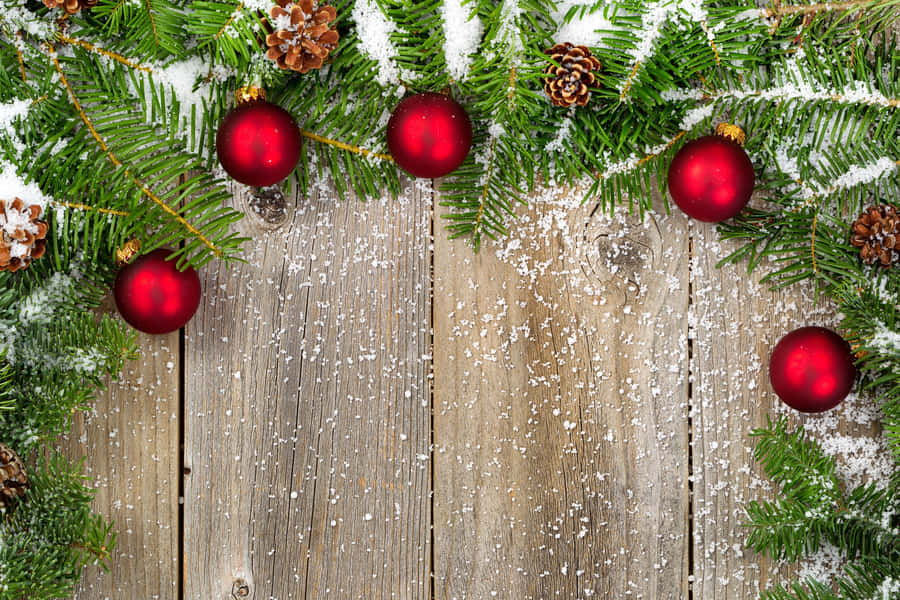 Farmhouse Christmas Garland With Red Baubles Wallpaper