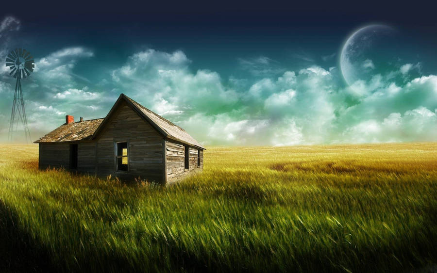 Farmhouse In Vast Grassy Field Wallpaper