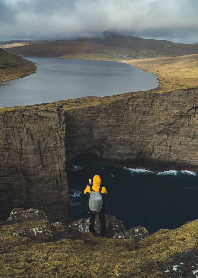 Faroe Islands Tourist In Cliff Wallpaper