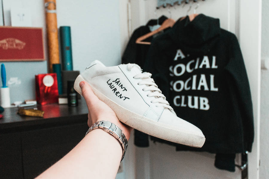 Fashion Forward With Anti Social Social Club Hoodie And Cool Sneakers Wallpaper