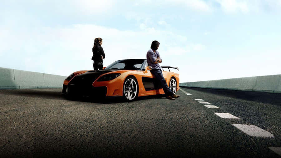 Feel The Rush Of Being Part Of An Iconic Franchise With Cool Fast And Furious Wallpaper