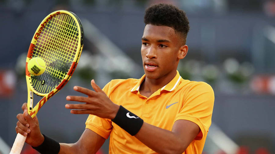 Felix Auger Aliassime Yellow Nike Shirt Wallpaper