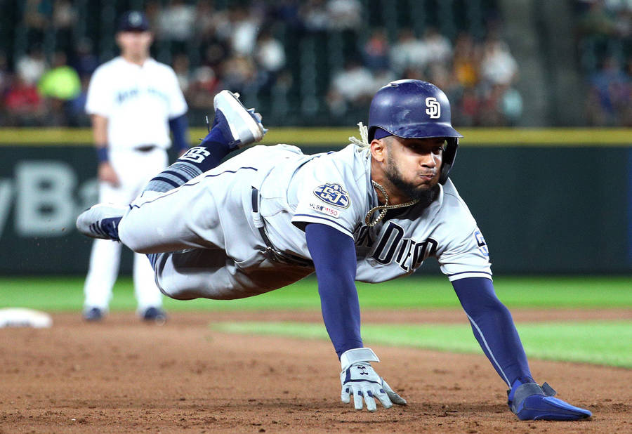 Fernando Tatis Jr Stealing Base Wallpaper