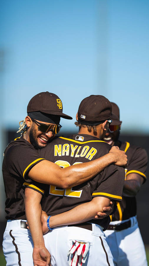 Fernando Tatis Jr With Teammates Wallpaper