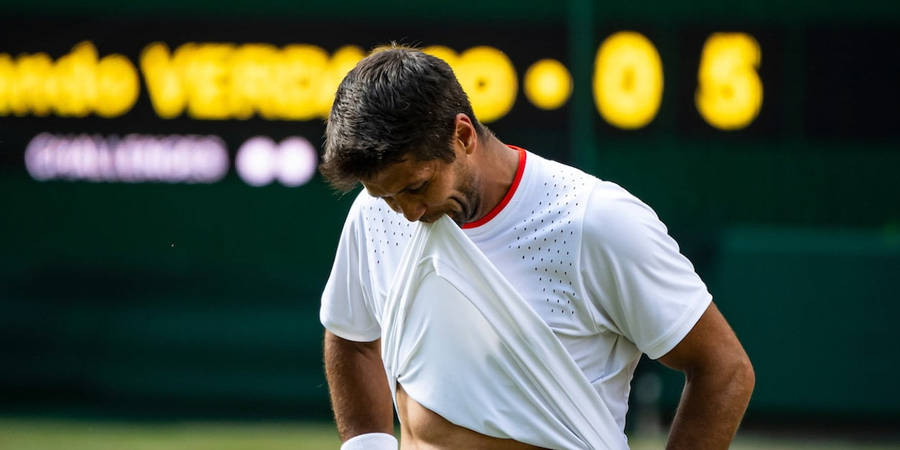 Fernando Verdasco With Shirt Up Wallpaper