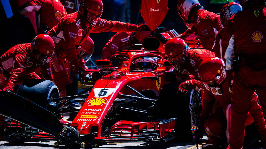 Ferrari F1 Sf15-t At Pit Stop Wallpaper