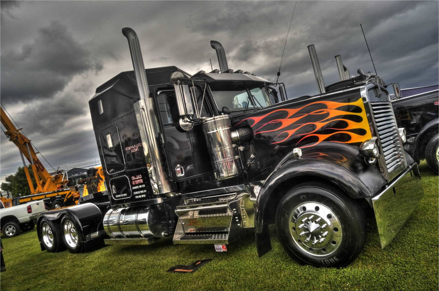 Fiery Kenworth Truck In Motion Wallpaper