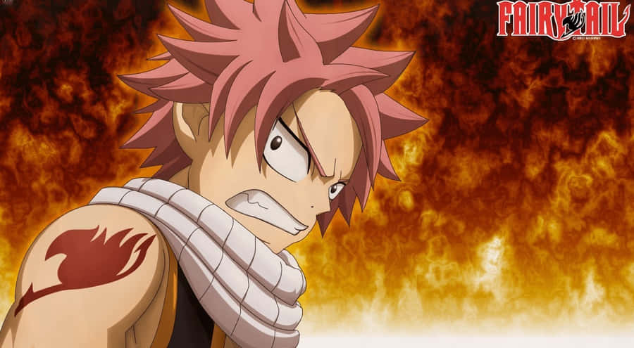 Fiery Natsu Dragneel In Action Wallpaper