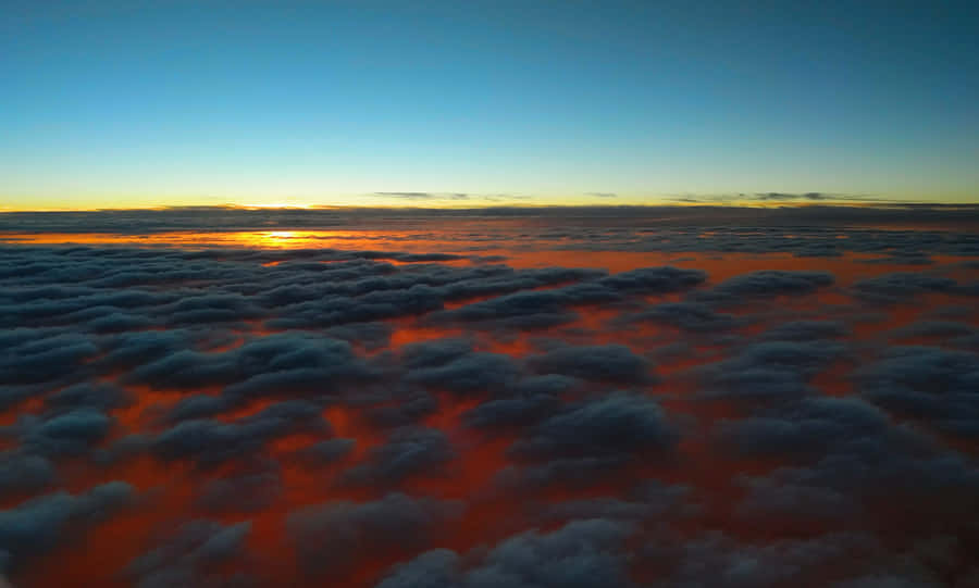 Fiery Red Sunset Cloud Wallpaper