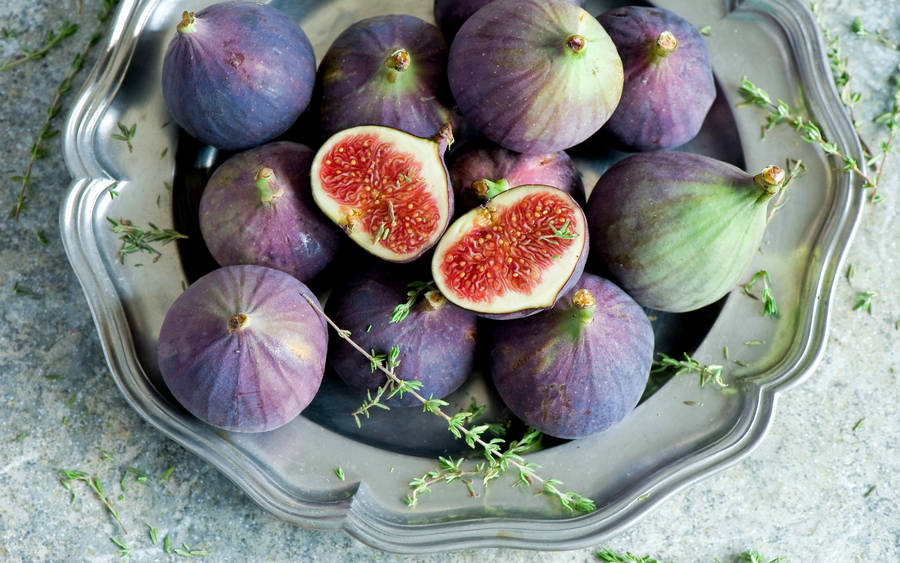 Fig Fruits And Herbs Arranged On Steel Tray Wallpaper