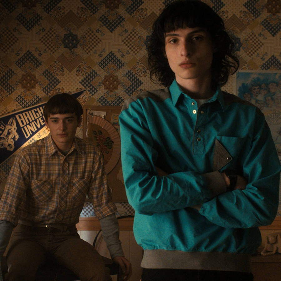 Finn Wolfhard In Bedroom Wallpaper