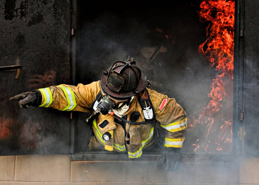 Firefighters In A Burning Building Wallpaper