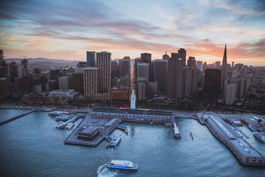 Fishermans Wharf And City Skyline Wallpaper