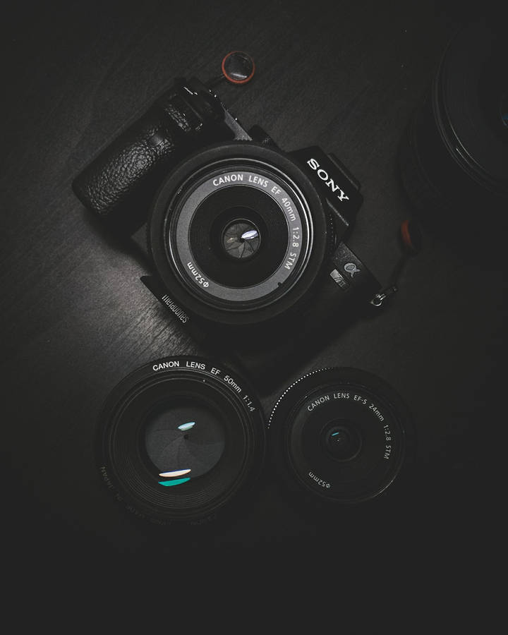 Flat Lay Photography Of Sony Dslr Camera Wallpaper