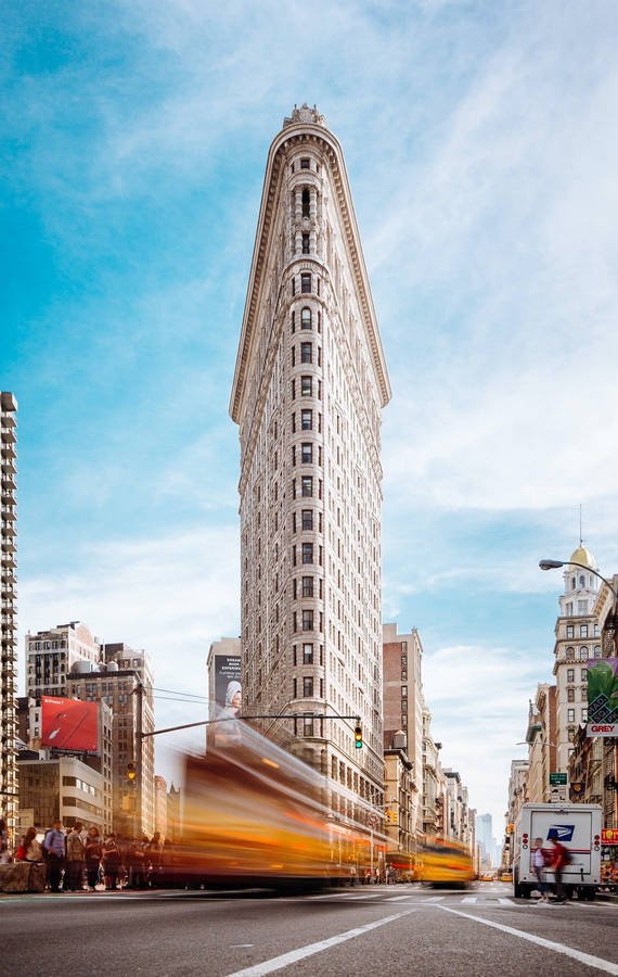 Flatiron Building Passing Bus Wallpaper