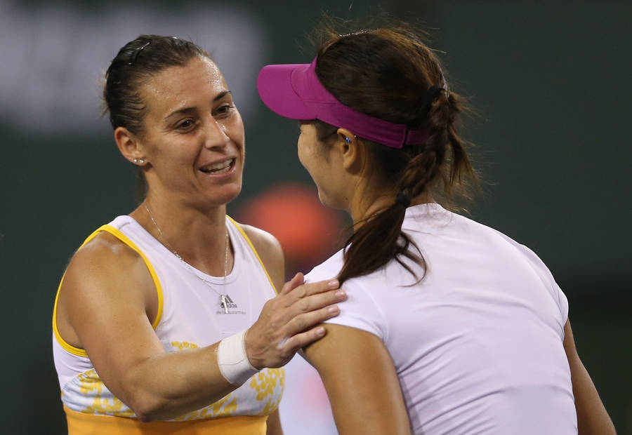 Flavia Pennetta Sharing A Moment With Li Na Wallpaper