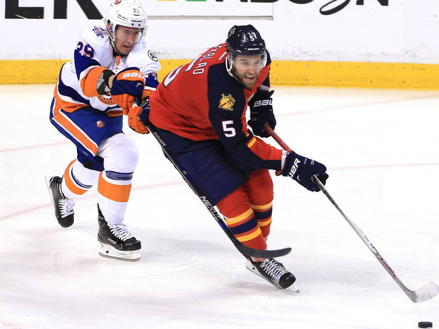 Florida Panthers Aaron Ekblad With New York Islanders Player Wallpaper