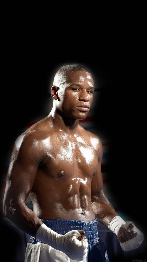 Floyd Mayweather Posing With Black Backdrop Wallpaper