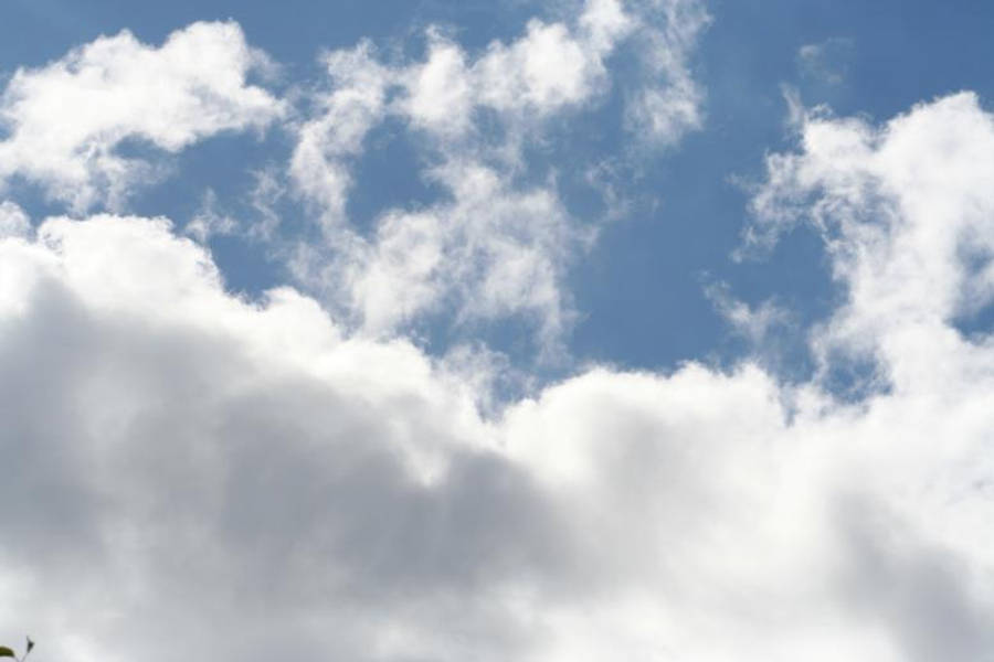 Fluffy Clouds Blue And White Wallpaper