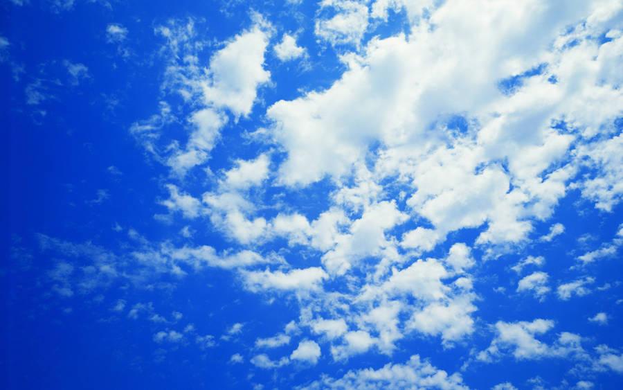 Fluffy Clusters Of Blue Aesthetic Cloud Wallpaper