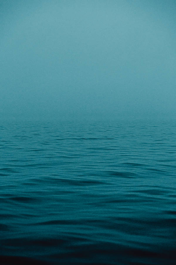Foggy Teal Ocean Wallpaper
