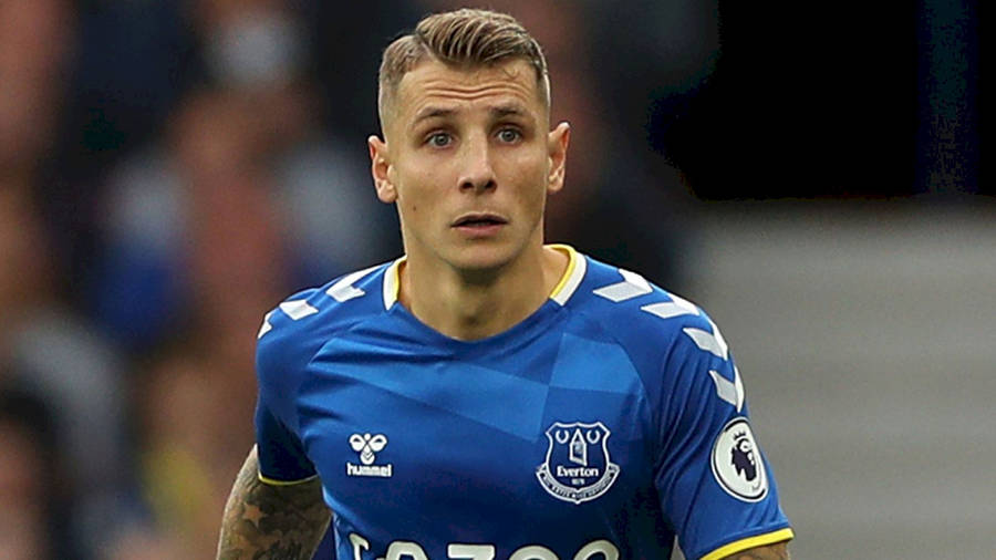 Football Player Lucas Digne Looking Up Wallpaper