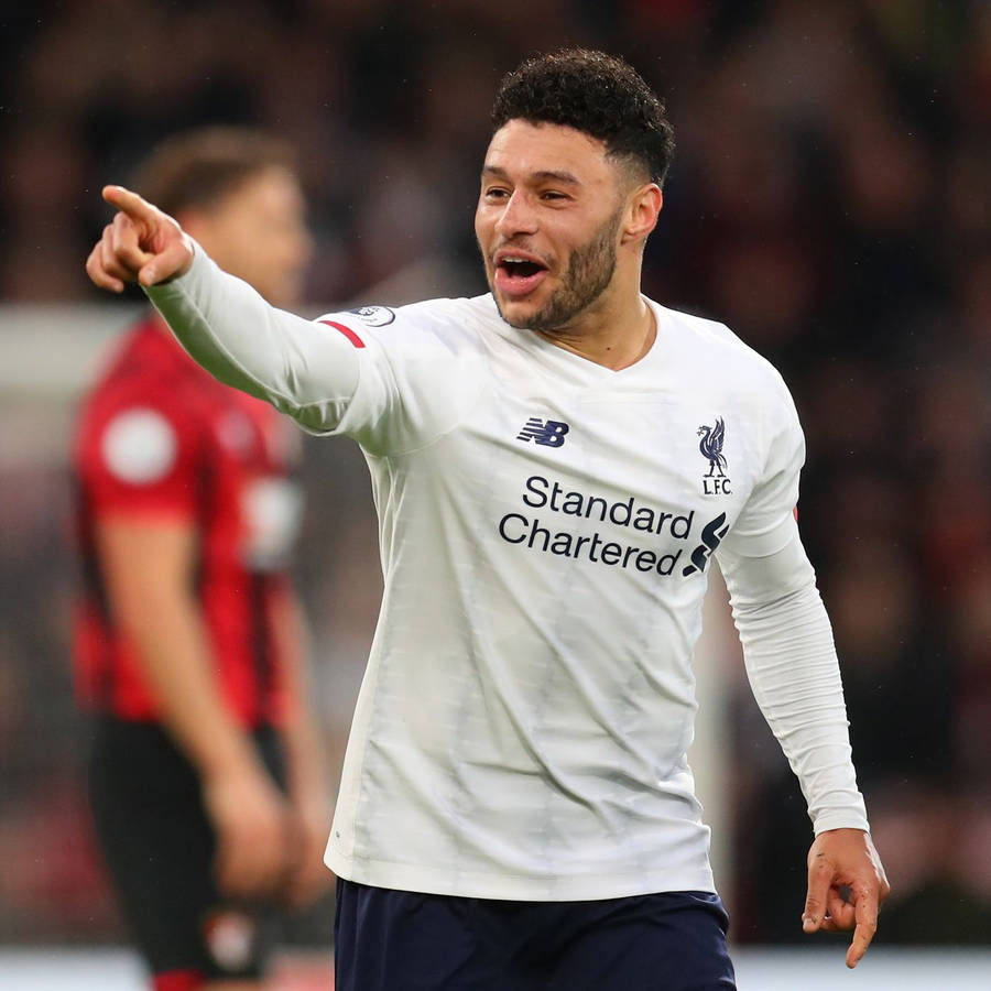 Footballer Alex Oxlade-chamberlain Pointing Wallpaper